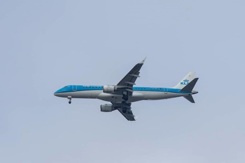 Embraer ERJ-190 jet passenger aircraft of Royal Dutch KLM cityhopper airlines in flight on approach