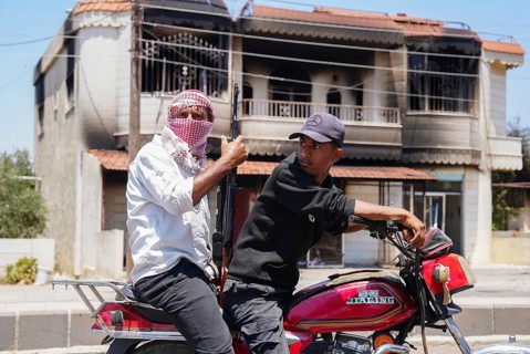 Sectarian violence in the Syrian city of Sweida between Druze factions loyal to Sheikh Hikmat