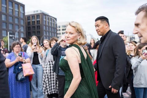 Pamela Anderson attends the film premiere of The Naked Gun at the UCI Luxe East Side Gallery,
