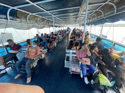 Ferry between Cebu and Negros, passengers on the upper deck, Philippines