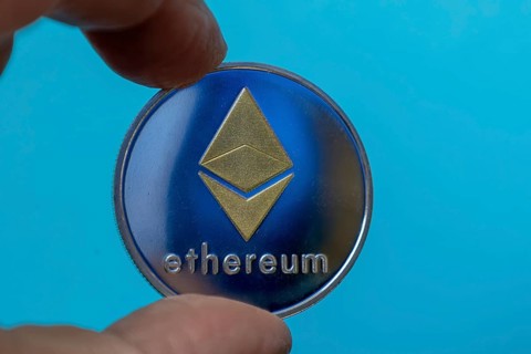 Close-up of a symbolic Ethereum coin