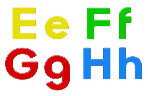 Colorful flat uppercase and lowercase magnetic plastic letters E through H isolated on a white