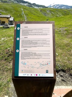 Information board on prehistoric and ancient pass crossings of the Little St. Bernard border pass,