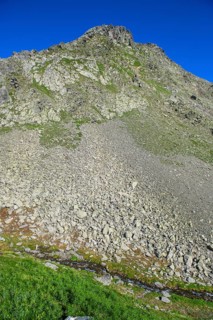 Smaller pieces of rock Rock stones lie eroded rock lies after landslide due to erosion on
