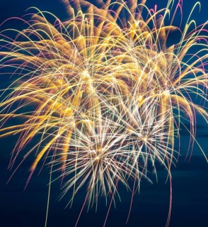 Brilliant fireworks with bright colours light up the night, atmospheric, magnificent, intense with