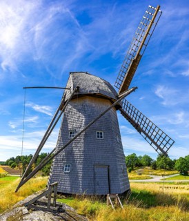 Historic windmill in an epic summer landscape near the burial ground of Stenhusbacken and the