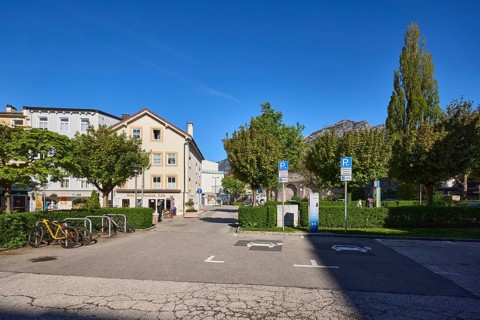 Car park, houses, building, car park, bicycle stand, bicycle, trees, hedge, blue sky, cloudless,