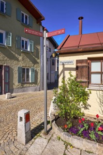 Signpost to the Peter and Paul Tower, signpost to Gruttenstein Castle, historic building, facade,