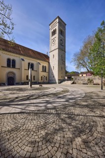 St. Nikolaus, church, trees, square, cobblestones, shadow, blue sky, cloudless,