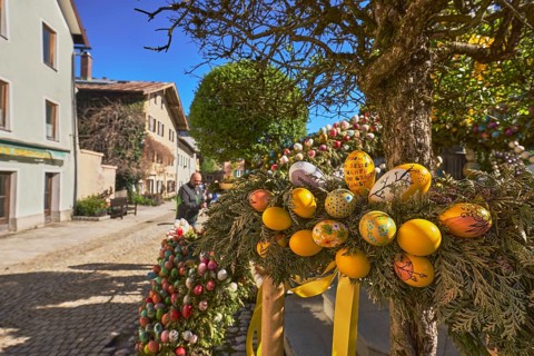 Easter fountain, Easter decoration, blown out coloured Easter eggs, historical building, depth of