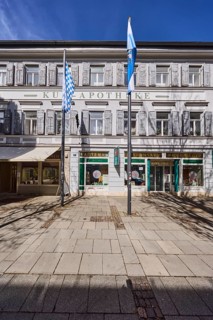 Kur-Apotheke, historical pharmacy, building, flagpoles, flags, facade, windows, entrance, doors,
