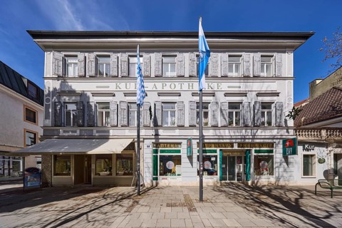 Kur-Apotheke, historical pharmacy, building, flagpoles, flags, facade, windows, entrance, doors,