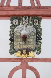 Monument with inscription : assembly house protestant, anno, roman, year, 1537, ornaments, relief,