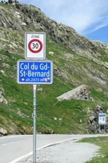 Traffic sign zone 30 at the border crossing from Italy to Switzerland at the Alpine pass Grenzpass