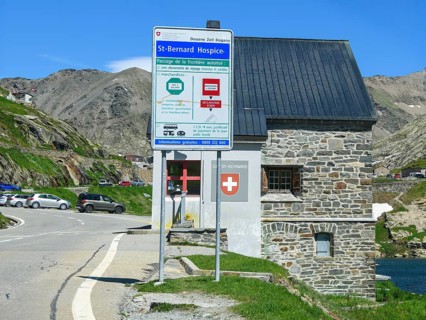 View of front sign with information for customs clearance at historic Swiss border building Border