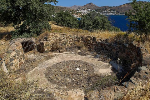 Lost place, base of an anti-aircraft battery, overlooking a village and the sea, surrounded by dry