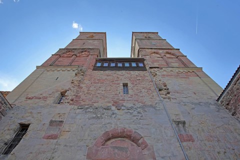 Romanesque St. Mary's Collegiate Church with twin towers, view upwards, perspective, church ruins,