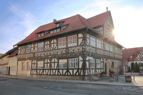 Historic official residence built in 1665 with backlight, half-timbered house, hipped roof, Themar,