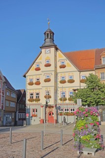 Market square with floral decoration and town hall, Schleusingen, Thuringia, Germany