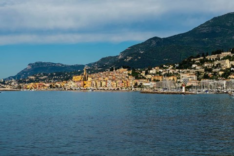 Town with colourful houses by the sea, Menton, Alpes Maritimes, Provence Alpes Cote d'Azur, French