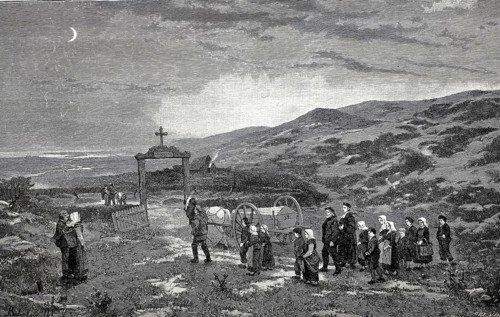 Funeral on Sylt, the coffin is driven to the cemetery in a carriage, the mourners walk behind,