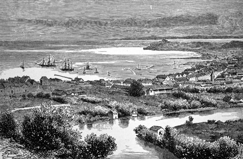 Trondheim on the fjord and river Nidelva, tall ship in roadstead, street with houses by the sea,