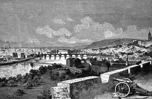 City view of Prague on the Vltava, Prague Castle with cannon, numerous towers, churches, Vltava