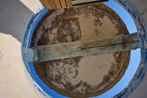 View from below of a dilapidated round roof structure with open sky, Lost Place, Lago anti-aircraft