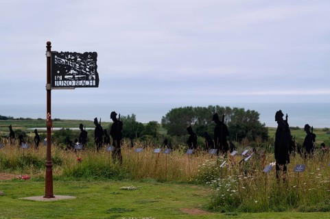 Installation, Juno Beach sign, Standing with Giants, honours the victims of the fallen British