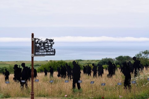 Installation, sign Sword Beach, Standing with Giants, honours the victims of the fallen British