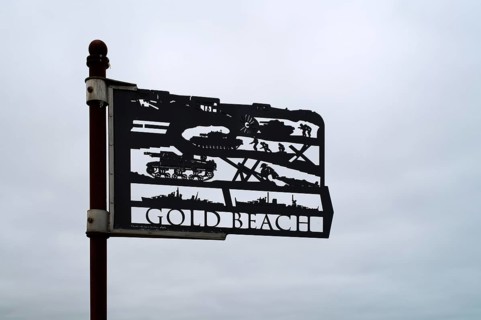 Installation, sign Gold Beach, Standing with Giants, honours the victims of the fallen British