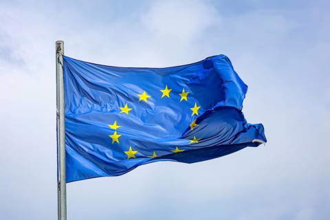 Düsseldorf, North Rhine-Westphalia, Germany - European flag fluttering in the wind on the flagpole,