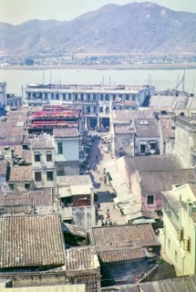View over rooftops of traditional buildings in city centre from hilltop of Monte Fort, Macau, Asia