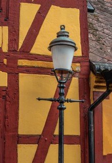 Old street lamp at a half timbered wall in Ystad, Skåne county, Sweden, Scandinavia