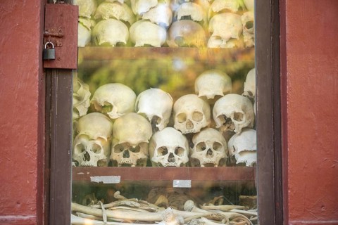 Shrine with human skull, memorial to the victims of the Khmer Rouge regime, Wat Thmei, Siem Reap,