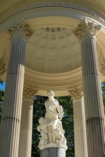 Statue of Venus with Cupid in the Temple of Venus above the terraced gardens, park of Linderhof