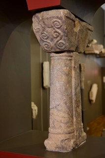 Decorated stone column with relief details, exhibited in a museum, Archaeological Museum, Agia