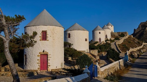 Several windmills along a winding road in natural surroundings, Pandeli Castle, Castle, Leros