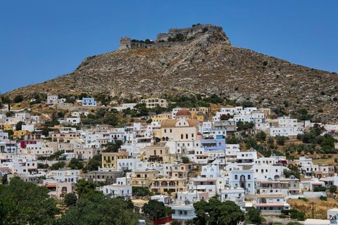 White village below a rocky castle on a hill, Pandeli Castle, castle, Leros Fortress, St John's