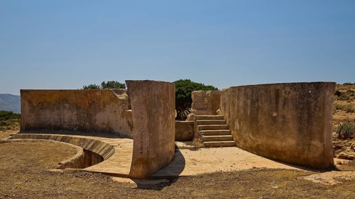 Concrete ruin with stairs and open walkway under clear sky, Lost Place, Air Defence Position,