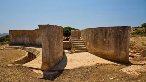 Crumbling concrete walls with stairs in a barren environment, Lost Place, Air Defence Position,
