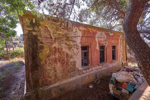 Lost Place, Old abandoned building with broken windows and surrounding nature, Radio Station, WW2,