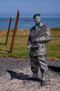 Sculpture by Bill Pendell MM, British World War II veteran, looking back at himself in the Battle