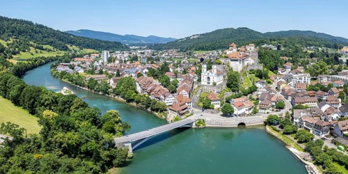 Aarburg town on the river Aare with church and fortress Aerial view panorama from above in Aarburg,