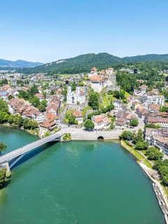 Aarburg town on the river Aare with church and fortress Aerial view from above in Aarburg,