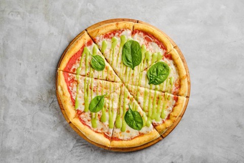 Mouthwatering pizza features a golden crust topped with rich tomato sauce, melted cheese, and fresh