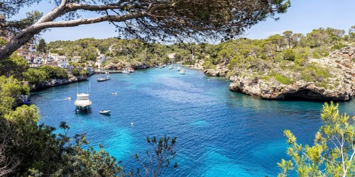 Bay of Cala Figuera on Majorca with sailboats panoramic holiday by the sea trip in Cala Figuera,