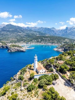 Port de Soller on Majorca with lighthouse aerial view holiday by the sea trip in Spain