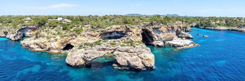 Es Pontas rock gate near Cala Santanyi on the island of Majorca in the Mediterranean Sea Travel
