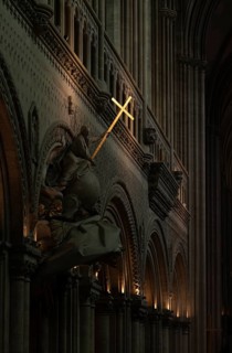 Interior view, angel on pulpit, holding a shining golden sword, Cathédrale Notre-Dame de Bayeux,